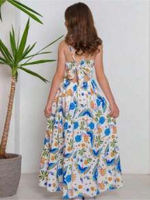 Girls' Long Summer Printed Dress With Bow On The Back, White And Blue, Bird And Flower Print, Flared Model For Girls, Light And Comfortable Fabric, Thin Straps, Ideal For Outings, Parties, Vacations, Beach And Everyday Life - Sizes 10 To 16 Years - Colorful And Fun Look With Tropical Print Of Birds And Coconut Trees, Fresh Dress With Movement, Modern And Stylish Children's Clothing For Girls, Teen Girl's Printed Dress With Delicate And Charming Style, Printed Women's Fashion With A Touch Of Summer, Children's Strap Dress For Grown Girls, Cheerful And Vibrant Print For Special Occasions And Casual Use, Comfortable Children's Clothing With A Loose Fit, Ideal For Hot Weather, Colorful Fashion For Stylish Girls, Dress With Exclusive Print And Bow Detail On The Back For An Authentic And Charming Look, Lightweight Long Dress For Teenage Girls, Stylish Long Women's Printed Dress For Youth Party - 彩色 - 查看 3