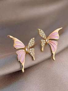 1 para eleganckich, luksusowych kolczyków w kształcie motyli z kapiącą ropą, wysokiej klasy design