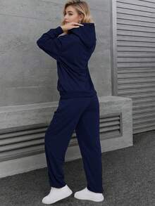 Conjunto  deportivo de pants con sudader de manga larga con cordones con abertura en la parte de adelante. - Azul Marino - Ver 3