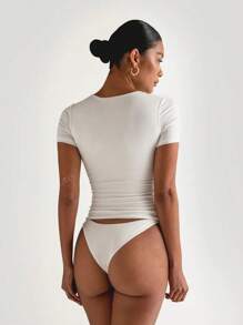 Camiseta casual básica blanca de mujer con cuello redondo, manga corta, ajuste ceñido y deportivo de XLLAIS Petite