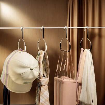 1个随机颜色帽子收纳架，适用于宿舍衣柜，多功能帽子展示架兼节省空间，轻便易携，时尚帽饰收纳架，适合小型衣橱，彩色可堆叠帽子架，方便取用，是春夏衣橱焕新和馈赠佳品的理想之选，结构坚固耐用，底部防滑，易于安装或独立放置，适用于棒球帽、针织帽、软呢帽和遮阳帽，透气展示设计，减少杂乱，以现代简约风格提升房间格调。