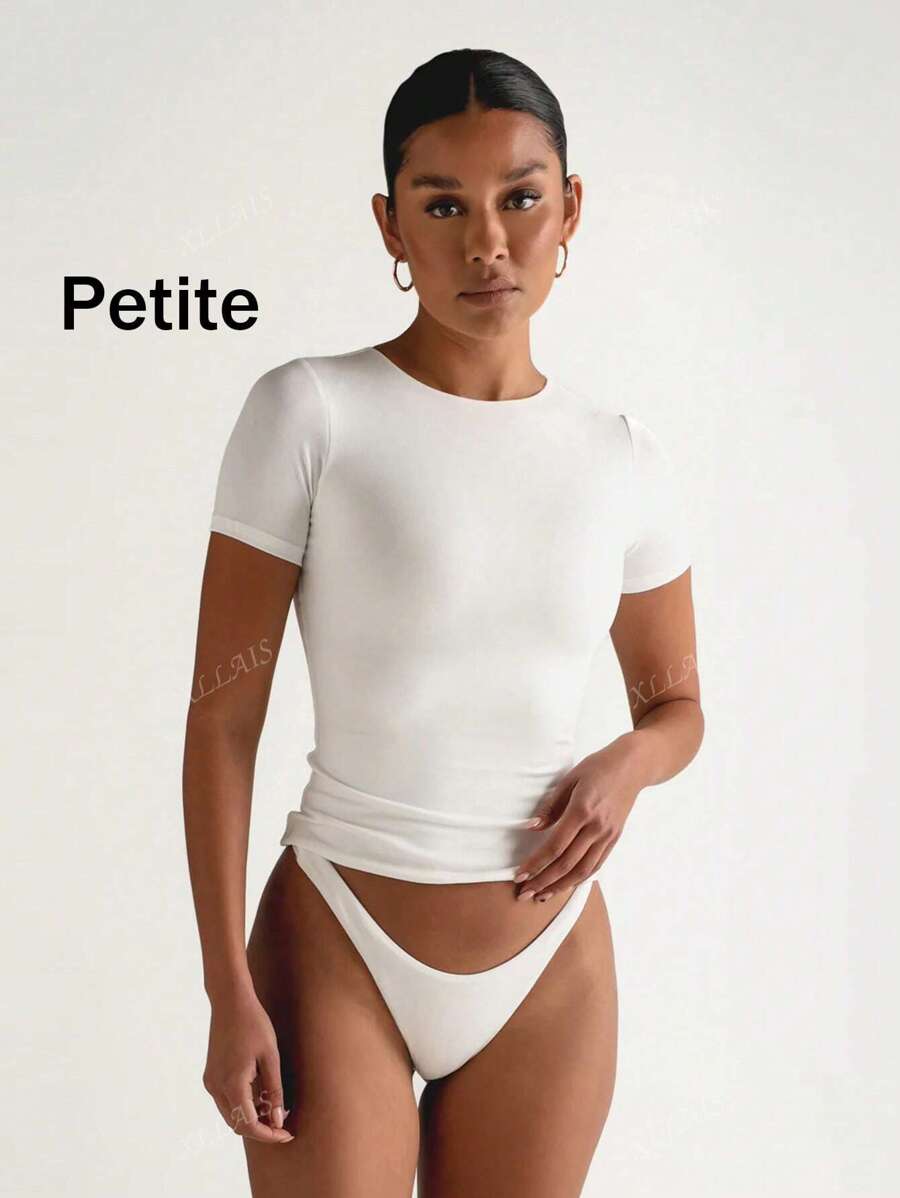 Camiseta casual básica blanca de mujer con cuello redondo, manga corta, ajuste ceñido y deportivo de XLLAIS Petite