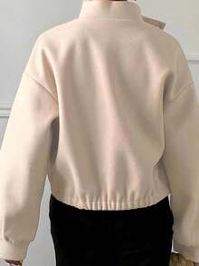 Veste courte ajustée pour femme, col montant, boutons devant, poches, ourlet élastique. Décontractée, de couleur unie, , idéale pour le sport, le quotidien ou l'aéroport