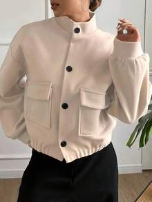 Veste courte ajustée pour femme, col montant, boutons devant, poches, ourlet élastique. Décontractée, de couleur unie, , idéale pour le sport, le quotidien ou l'aéroport