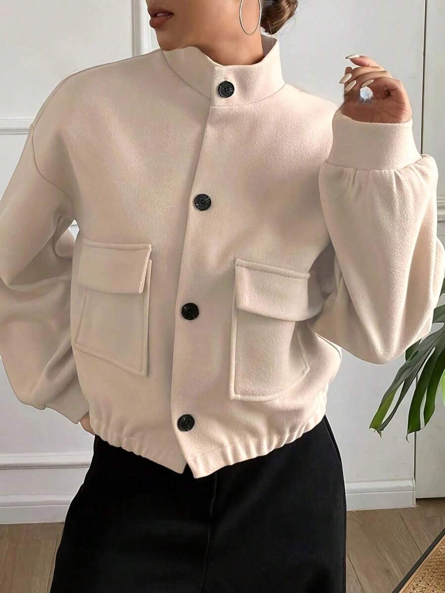 Veste courte ajustée pour femme, col montant, boutons devant, poches, ourlet élastique. Décontractée, de couleur unie, , idéale pour le sport, le quotidien ou l'aéroport
