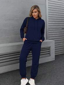 Conjunto  deportivo de pants con sudader de manga larga con cordones con abertura en la parte de adelante. - Azul Marino - Ver 1