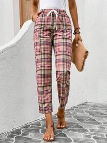 Pantalones mujer cuadros patrón distintivo rayas entrecruzadas líneas geométricas cintura elástica cordón ajustable blanco bolsillos laterales funcionales silueta recta corte recto piernas largas tela suave algodón mezcla transpirable ligera cómoda relajada holgada amplia casual urbano moderno contemporáneo juvenil elegante sofisticado chic minimalista básico esencial guardarropa imprescindible temporada primavera verano otoño conjunto atuendo look diario cotidiano oficina trabajo universidad colegio paseo cita informal formal combinable versátil funcional práctica duradera resistente lavable fácil cuidado tallas disponibles moda actual - Rosa / Blanco - Ver 3