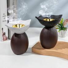 Un quemador de incienso y difusor de aroma de resina de estilo moderno y sencillo. Es adecuado para la decoración del hogar, dormitorios, salas de estar (como decoración central), oficinas, lugares de yoga y fiestas, creando una atmósfera elegante. También se puede utilizar para la decoración del templo. Este quemador de aromas es un regalo ideal para festivales, para los que regresan a la escuela, como regalo de graduación, o como regalo para las mujeres.