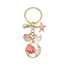 1 pièce Porte-clés style océan doré, pendentif de breloque coquillage, étoile de mer, hippocampe, fausse perle. Accessoire de voiture, de sac, breloque scolaire, fausse perle, gothique mignon Y2K