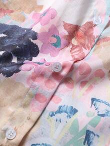 قميص نسائي كبير الحجم بأكمام طويلة مطبوع عليه أزرار بتصميم بسيط