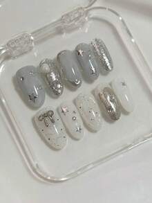 長款杏仁形穿戴甲，手工打造，腮紅漸層暈染，星星、蝴蝶結、小飾品、透明立體貝殼紋路、翅膀，亮白色細閃，精緻優雅的高端時尚配件，適合節日聚會或日常佩戴，可重複使用，手工穿戴甲 - Follow Your Heart - 查看 4
