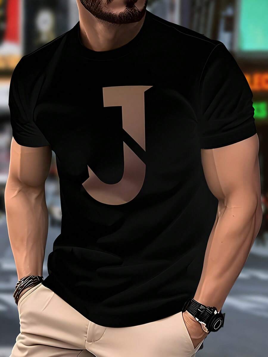 Una camiseta casual de manga corta para hombre, con estampado de la letra J, de tela cómoda, ropa masculina a la moda, ropa de descanso para hombre. - Negro - Ver 1