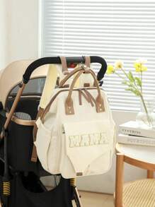 1 件多功能大容量妈咪包，轻便时尚尿布包可挂在婴儿车上