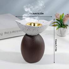 Un quemador de incienso y difusor de aroma de resina de estilo moderno y sencillo. Es adecuado para la decoración del hogar, dormitorios, salas de estar (como decoración central), oficinas, lugares de yoga y fiestas, creando una atmósfera elegante. También se puede utilizar para la decoración del templo. Este quemador de aromas es un regalo ideal para festivales, para los que regresan a la escuela, como regalo de graduación, o como regalo para las mujeres.