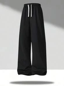 男士宽松轻便透气运动裤，夏季理想之选。采用简约纯色设计，配有抽绳和松紧腰带。适合多种场合：通勤、休闲、慢跑和购物。也是送给男友或丈夫的绝佳礼物。 - 黑色 - 查看 7