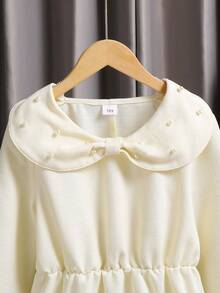 Robe casual à manches longues col claudine pour filles, robe élégante avec taille cintrée et décoration de perles, couleur abricot, convient pour l'automne/l'hiver