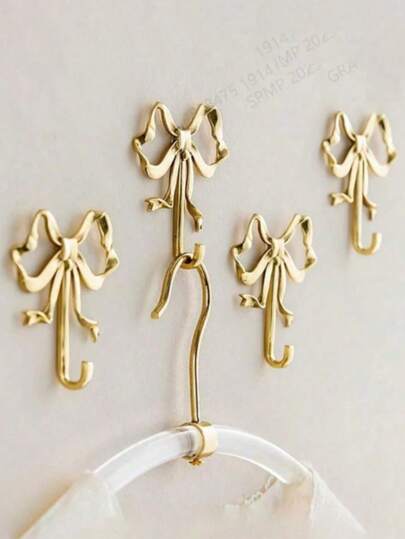 Gold Bowknot Wall Hook, Gold Bowknot Hanger, Brass Bowknot Wall Hook, Door Hook, Towel Hook, Brass Clothing Hook, Suitable For Wedding, Bathroom, Living Room, Kitchen Decor Hanging Hook, Brass Metal Wall Mounted Clothes Rack, Suitable For Living Room And Bathroom, Painted Surface, Easy To Install, Retro Ribbon Design Hook, Suitable For Bedroom And Bathroom, Nordic Retro Clothes Hook, Clothes Hook, Bedroom Porch Bathroom Decor, Solid Brass Bowknot Shaped Wall Hook