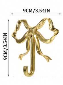 金色蝴蝶结壁钩，金色蝴蝶结衣架，黄铜蝴蝶结壁钩，门钩，毛巾钩，黄铜衣钩，适用于婚礼、浴室、客厅、厨房装饰的挂钩，黄铜金属壁挂式衣架，适用于客厅和浴室，烤漆表面，易于安装，复古丝带设计挂钩，适用于卧室和浴室，北欧复古衣钩，衣钩，卧室门廊浴室装饰，实心黄铜蝴蝶结形壁钩 - 彩色 - 查看 12