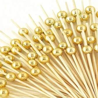 100 piezas de elegantes palillos de bambú para frutas con cuentas doradas en la parte superior - perfectos para aperitivos, bebidas, frutas, canapés y bodas, decoración de bodas | Tenedores de frutas con cuentas doradas elegantes | Palitos de bambú duraderos para bandejas de frutas y talla grande