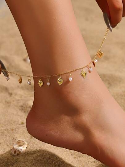 1条简约心形脚链，个性化设计，镂空心形搭配仿珍珠吊坠，适合情侣佩戴，沙滩装。