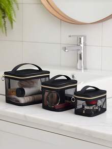 透明化妆包，防水便携，容量大。这是一款小巧便捷的女士旅行洗漱包。旅行必备品。女士包。大学必备品。旅行。女士包，度假必备品，化妆包，洗漱包，旅行必备品，旅行，包。化妆包，洗漱包，旅行必备品，女士包 - 黑與白 - 查看 4