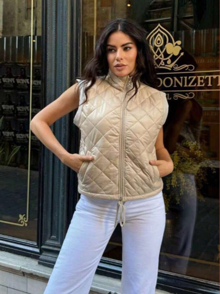 سترة نسائية بدون أكمام ذات لون واحد مبطنة، سترة ذات لون واحد بنسيج مضلع - بيج - مشاهدة 1