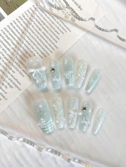 Summer Nail Art With A Fresh And Sweet Girlish Style - 10 Medium-Length Coffin-Shaped Pressed Fake Nails. The Base Color Is Mint Green With A Gradient Of Bright Shimmer. Hand-Painted French Checkered Silver Lines Are Paired With White Bows And Five-Pointed Star Diamonds, Creating A Delicate And Gentle Look That Enhances Your Complexion. Nail Supplies Nails