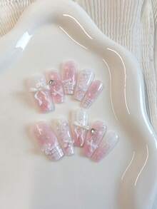 Summer Nail Art With A Fresh And Sweet Girlish Style - 10 Medium-Length Coffin-Shaped Pressed Fake Nails. The Girl'S Pastel Color Serves As The Base Color, With A Gradient Of Shiny And Glittering Details. Hand-Painted French Checkered Silver Lines Are Paired With White Bows And Five-Pointed Star Rhinestones Nail Supplies Nails Handmade Press On Nails - Baby Pink - View 2