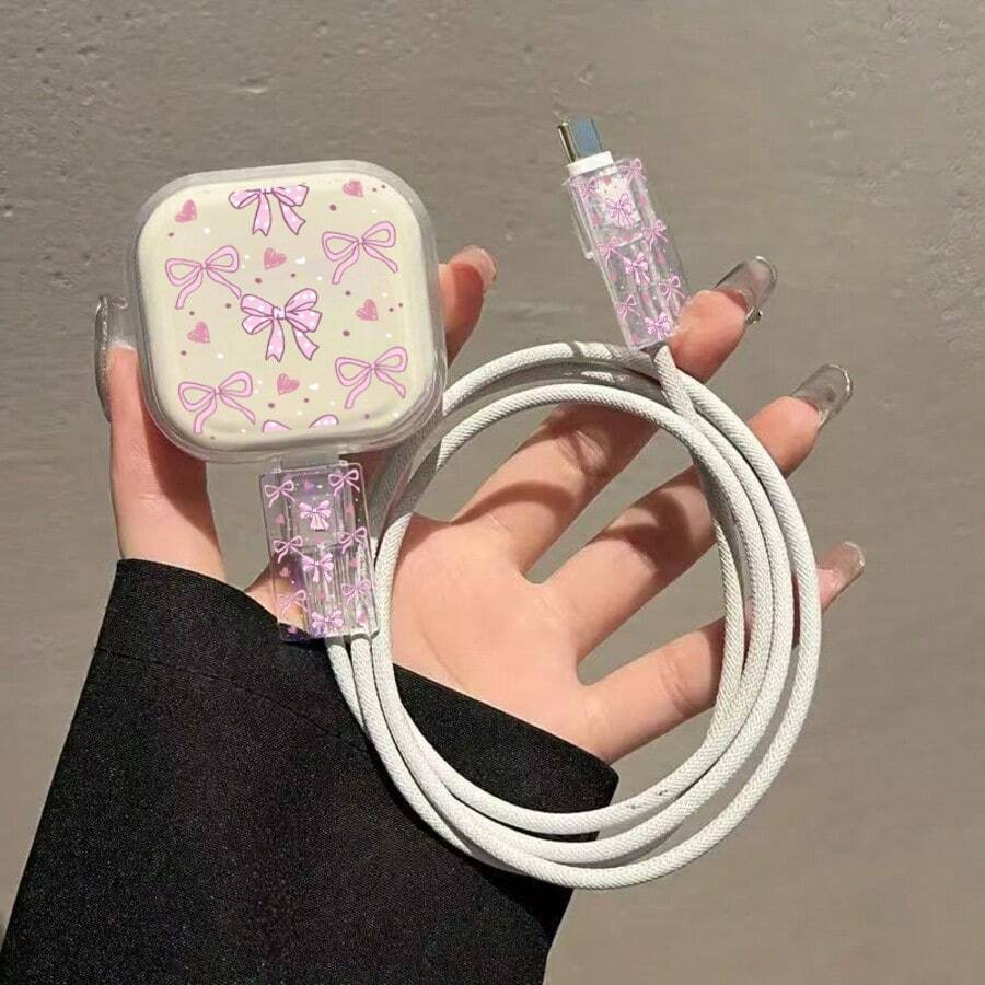 蝴蝶结/爱心/花朵/动物图案保护壳，兼容 16/15/14/13，配备20W英规快充适配器（带防弯折保护套），不含电池，附赠保护盒，适合作为礼物送给朋友。 - 粉紅領結愛心 - 查看 1