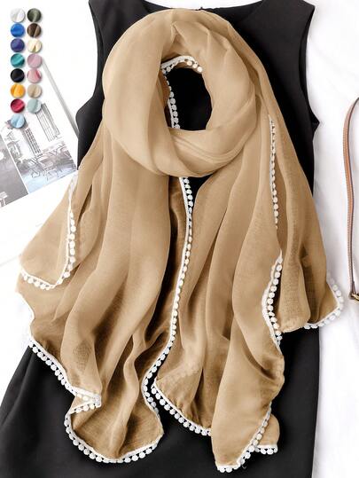 1条巴厘岛风格女士纯色薄纱长围巾，饰有花卉边饰，透气柔软，用途广泛，适合日常穿着或搭配连衣裙。