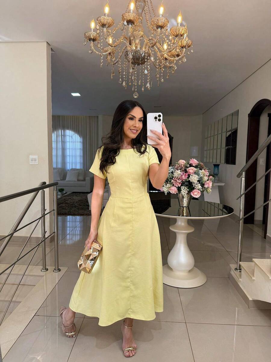 Elegant Midi Dress With A Flowing Fit And Fitted Design - Yellow - View 1
