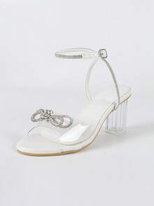 女士时尚新款水钻蝴蝶结透明带粗跟圆头白色高跟凉鞋