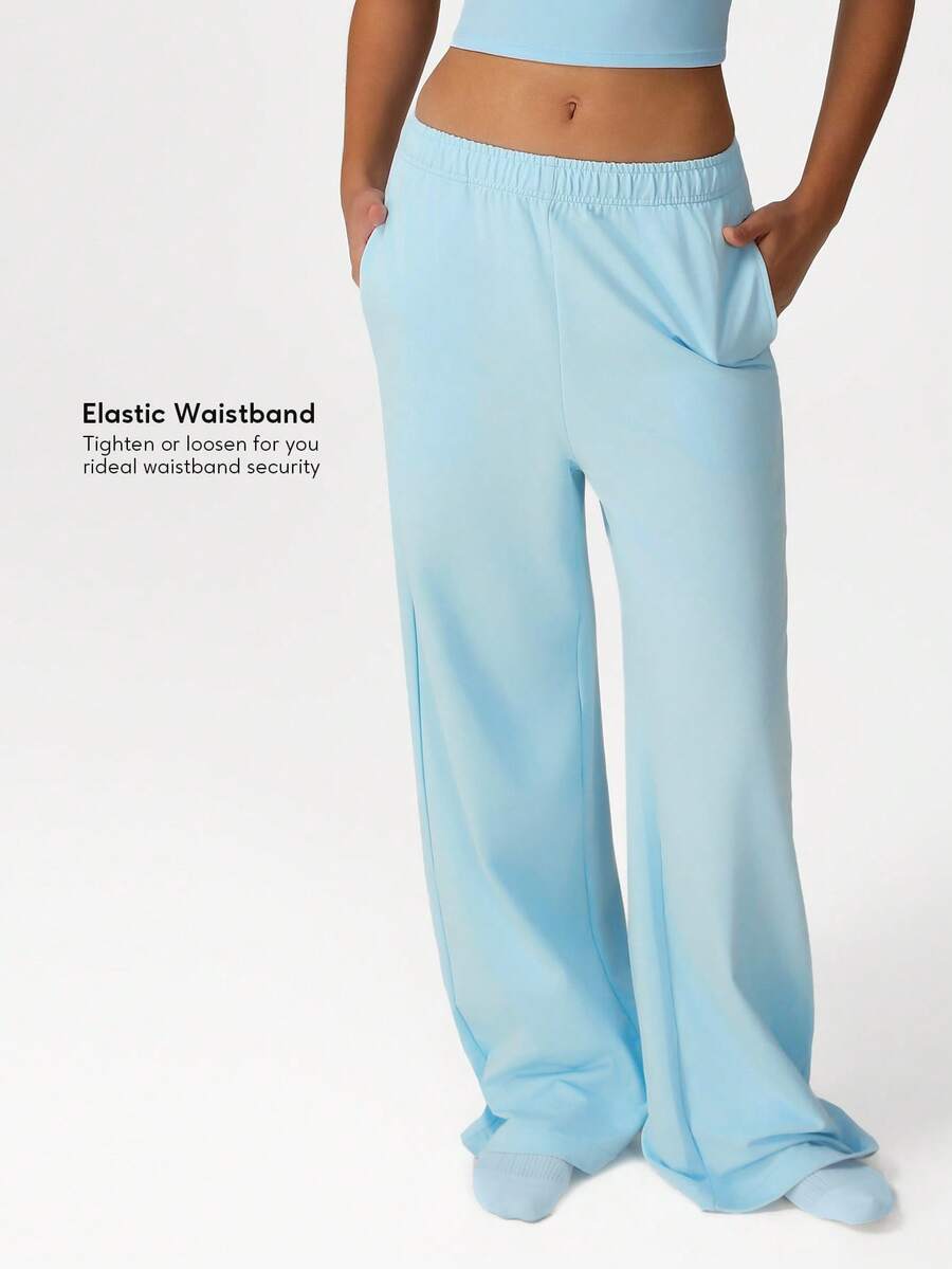 Sodalemon Pantalones anchos informales de mujer para entrenamiento con cintura elástica, bolsillos laterales, para deportes y actividades al aire libre - Celeste - Ver 1