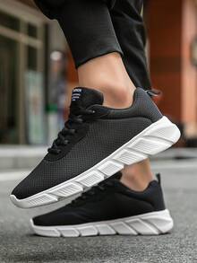 Giày thể thao nam buộc dây lưới phối màu đen trắng thời trang, nhẹ và thoải mái, giày sneaker thể thao đa năng cho các hoạt động ngoài trời quanh năm. - Đen và trắng - Xem 10