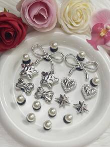 Nueva moda de accesorios para el calzado con diseños de corazón con lazo de plata electrolítica original para decoración de zapatos DIY. Conjunto de 20 piezas que incluyen estrella hueca, perla 3D y hebilla de zapato desmontable