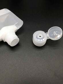 10个旅行装防漏液体容器，化妆品收纳袋，洗发水吸盘袋，防水挤压袋，符合航空旅行标准，适用于洗发水、护发素、乳液、沐浴露等，适合海滩、暑假、返校季（100毫升） - 無色 - 查看 9