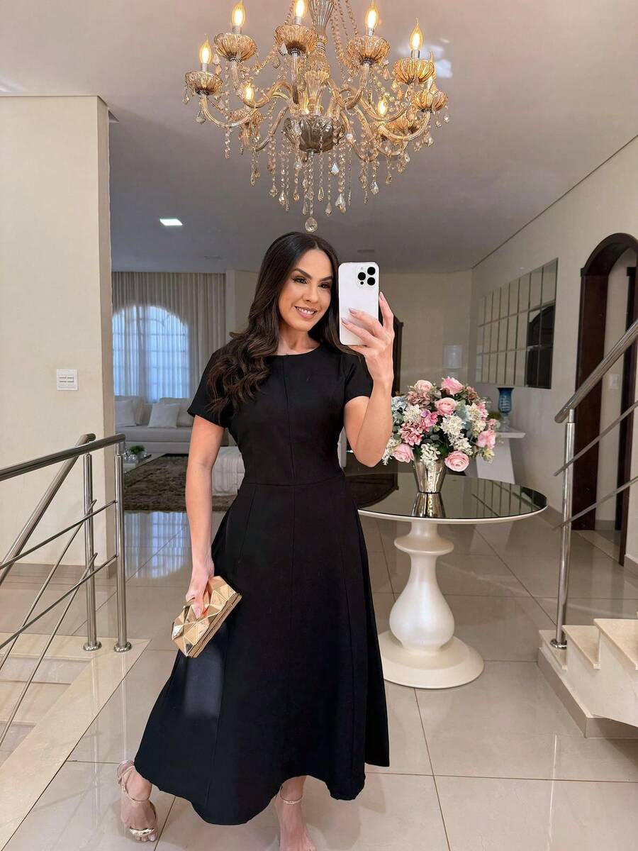 Elegant Midi Dress With A Flowing Fit And Fitted Design - Black - View 1