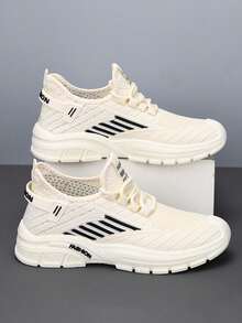 Zapatillas deportivas para hombre de color liso, transpirables y cómodas, ligeras y cómodas para correr, con diseño de cordones y puntera redondeada. Zapatillas de tenis para hombre con diseño sencillo de cuatro rayas. Zapatillas planas para hombre con diseño de caña baja y sin cordones. - Blanco - Ver 2