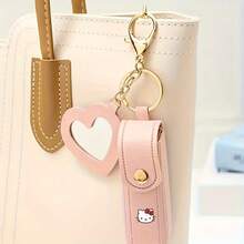 Sanrio 1PC Sanrio Hello Kitty Portable Lipstick Storage Box With Heart-Shaped Mirror - Leather Lip Balm Protective Case, Cute Keychain Pouch (Hanging Design), Mini Coin Purse & Lipstick Holder, Ideal Gift For Girlfriend, Bestie & Daily Use