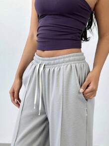 1 pieza Pantalones de mujer de unicolor con cordón, casuales, aptos para primavera/otoño, todas las estaciones, con bolsillos, pantalones deportivos de primavera
