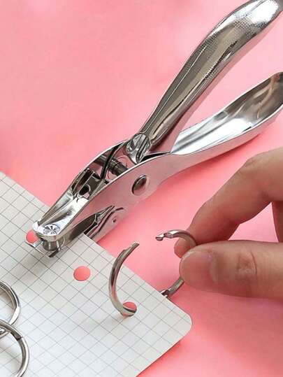 坚固耐用的金属手持式打孔器：直径 6 毫米圆形，盒装，办公专用。操作简便，是家庭办公室、学校、工作场所的理想之选。非常适合上班族、学生、教师、行政人员和手工爱好者。