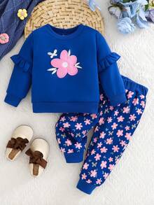 Baby Mädchen Set aus blau gerüschtem Langarmoberteil und komplett rosa floral bedruckter Hose, 2-Teilig, Herbst/Winter - Blau - Übersicht 1