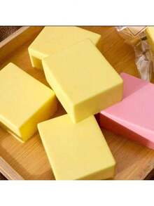 软牛奶砖慢回弹软粘手仿真玩具，逼真的黄色黄油蛋糕，带有高端糕点香气和柔软的质地，玩起来非常有趣