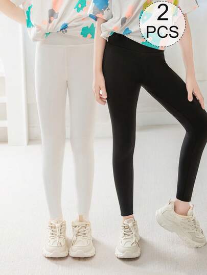 2/1 双女童瑜伽裤，夏季儿童紧身裤，儿童紧身裤，7/8 长度紧身裤，白色，黑色，纯色，多色，春夏季，四季轻便，休闲裤，7/8 裤，简约时尚，适合日常穿着，运动装，可作为裤子穿着，柔软舒适的紧身裤，学生可搭配短袖，适合返校季节，休闲百搭，学生，新学期，返校，教室
