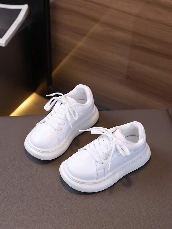 1 par de zapatillas casuales de suela blanda para niños, zapatos de piel de unicolor para niños pequeños para el jardín de infantes y la escuela