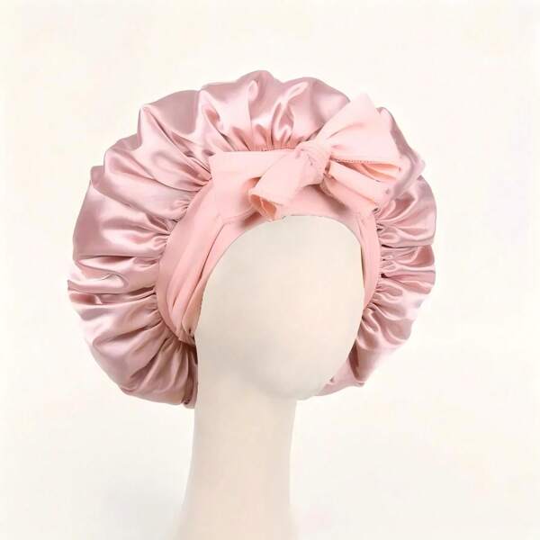 Gorro de satén rosa lujoso con cinta ajustable y acento de lazo - Protección suave para el cabello para mujeres y hombres, diseño acolchado cómodo para un ajuste ceñido, protección del cabello | Gorro de satén | Acabado de satén suave