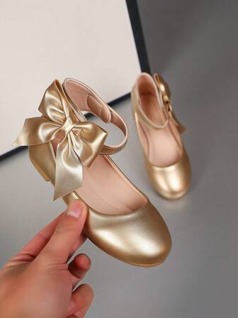 儿童芭蕾平底鞋，踝带蝴蝶结装饰，展现优雅鞋款