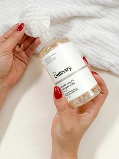 Solución exfoliante nocturna ácido glicólico siete por ciento The Ordinary 240ml tratamiento facial renovación piel limpieza profunda rutina belleza despigmentante vegano