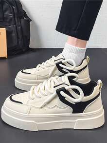 男士时尚厚底运动鞋，优质皮革拼接设计，醒目的黑白拼色，绳状鞋带增添个性化，低帮平底，休闲风格，百搭乳白色调，适合所有季节，日常穿着出众