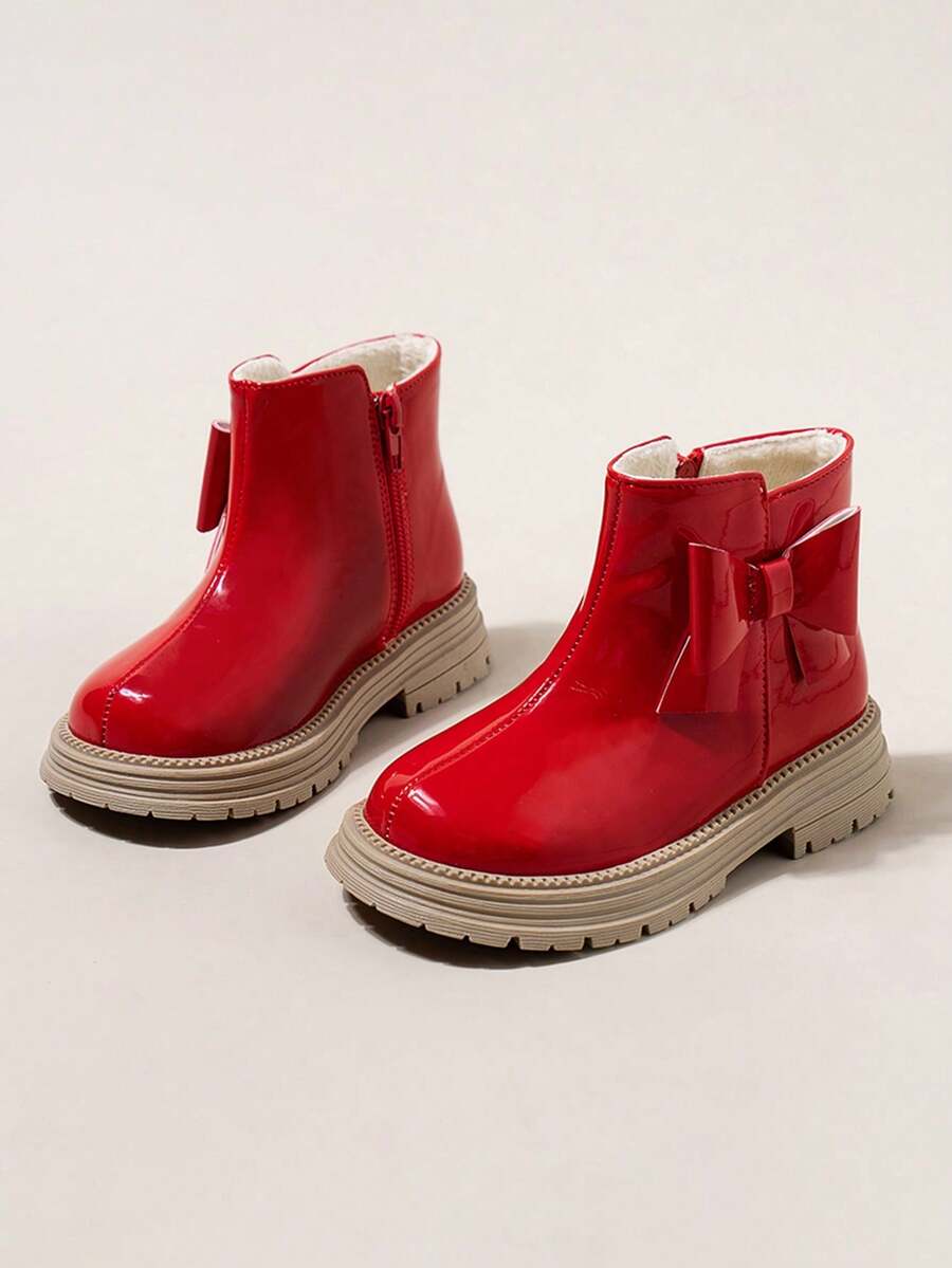 一双儿童红色蝴蝶结装饰闪亮靴子，配有毛绒衬里，适合寒冷天气、生日派对和日常服装，可与节日活动和校服搭配，女童鞋、校鞋、牛仔靴、战斗靴、女童靴、男童靴、保暖鞋、冬鞋 - 紅色 - 查看 1